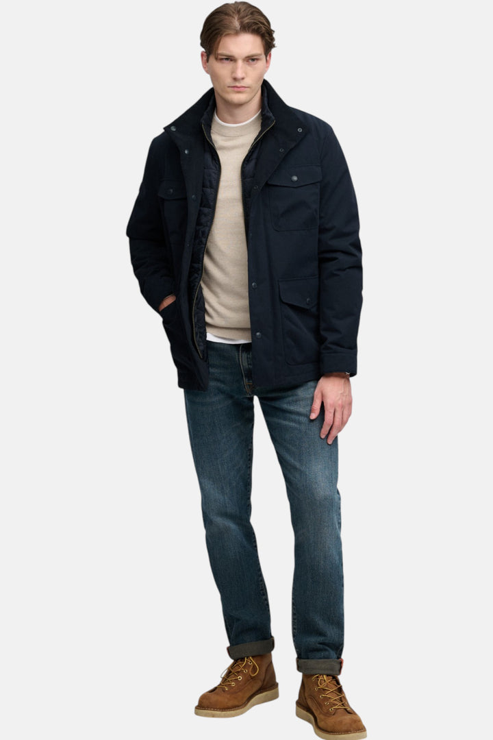 Navy Burford 2-in-1 jacket with button front, flap pockets, standing collar