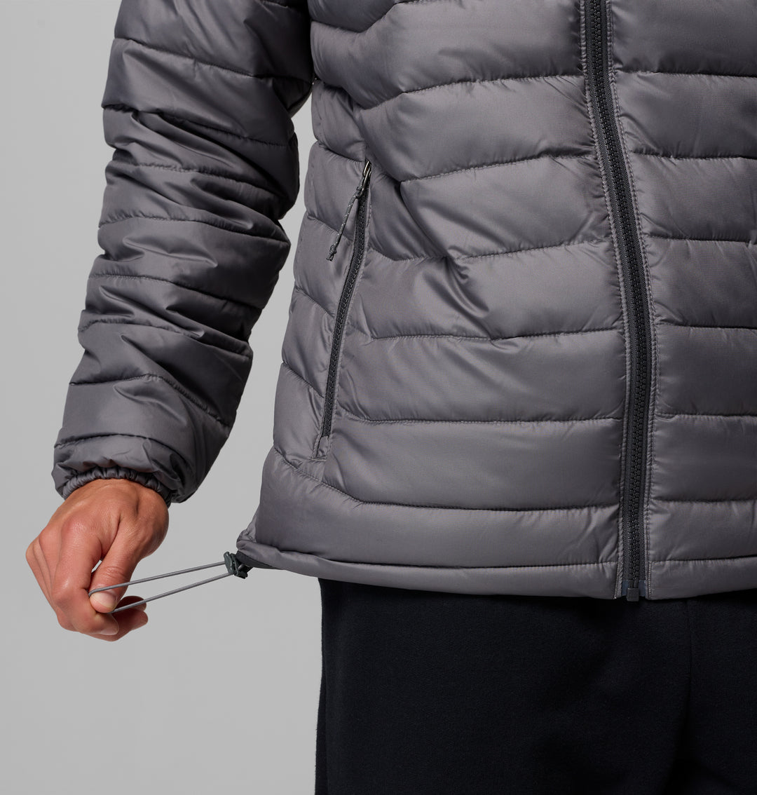 Columbia Powder Lite II jacket detail, dark gray zip pocket seam and elastic hem cinch