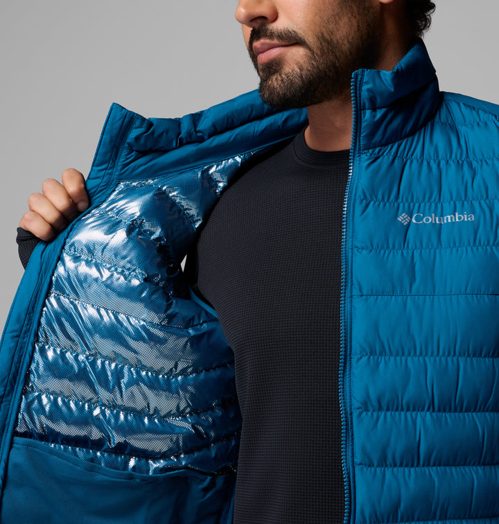 Blue puffer vest close-up with zip-front and interior lining visible.