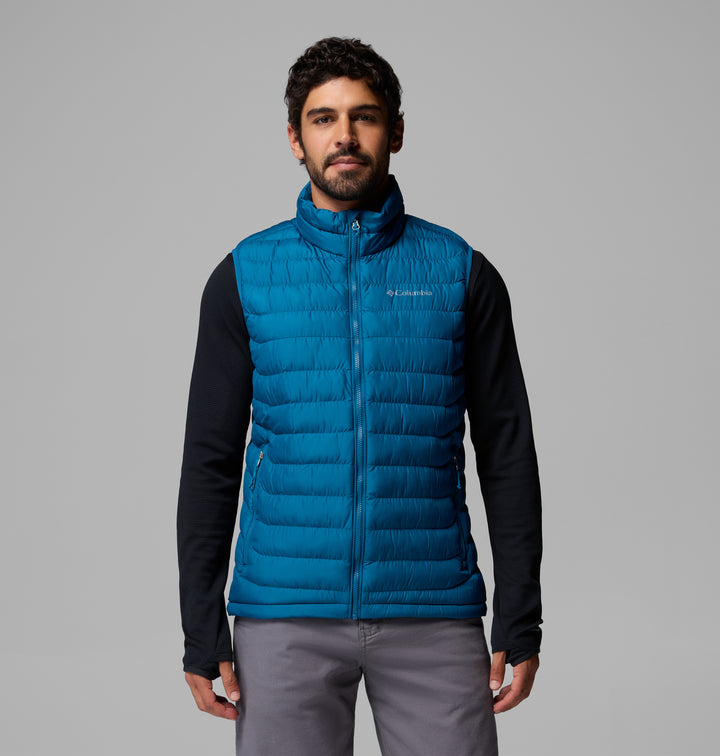 Blue quilted puffer vest with zip-front and standing collar.