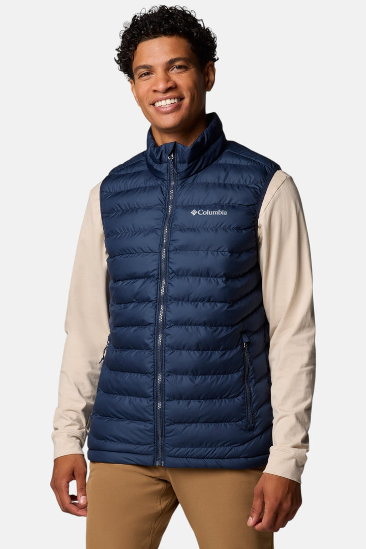 Men's navy quilted insulated vest with full-zip front and stand collar