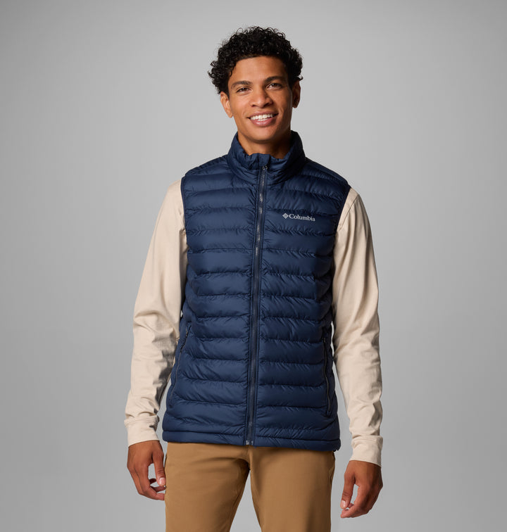 Men's navy quilted insulated vest with full-zip front and stand collar