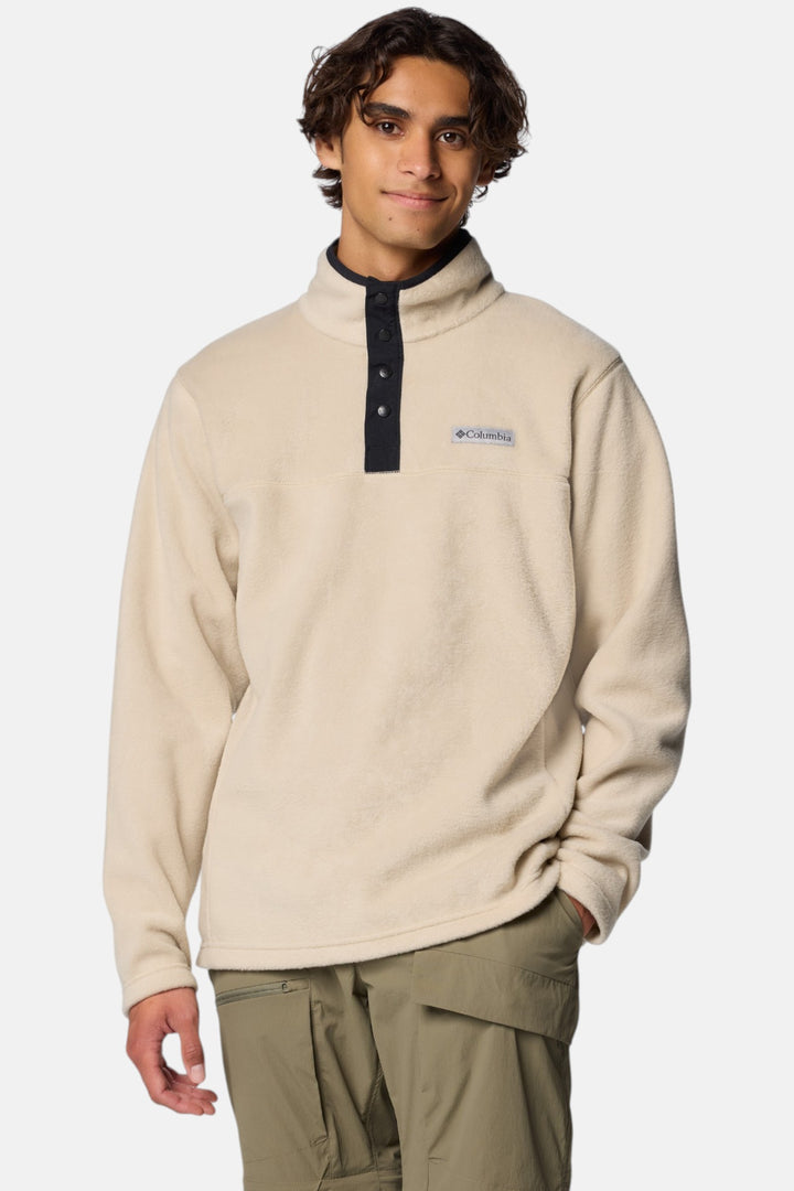 Men's half-snap fleece pullover in light beige with black placket and logo chest patch