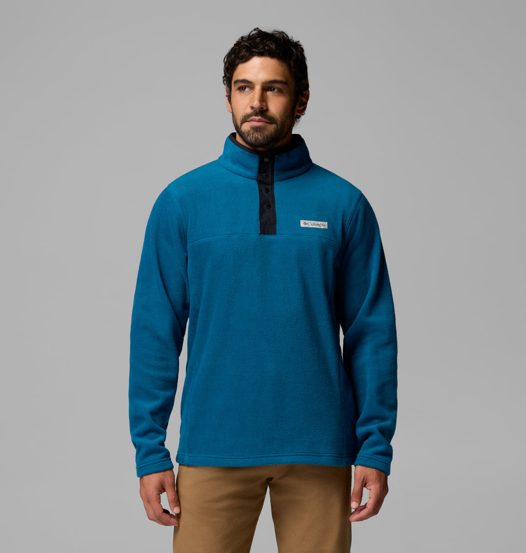 Blue fleece half-snap pullover with stand collar and small chest logo patch