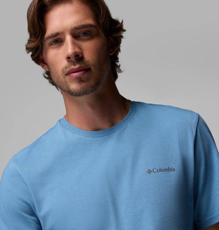 Men's blue crewneck t-shirt close-up with Columbia logo on chest