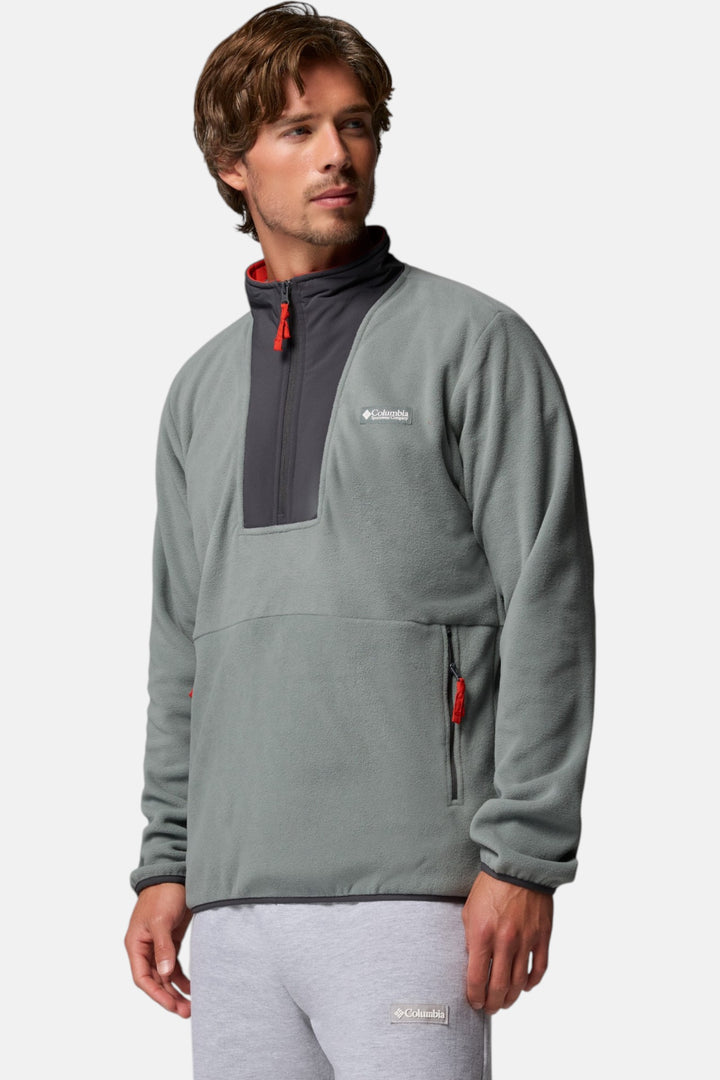 Men's sage green half-zip fleece pullover with black panel and orange zipper pulls
