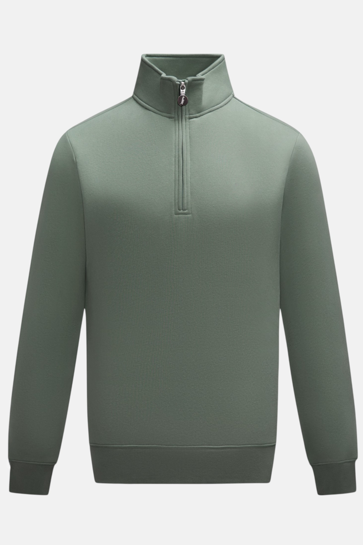 6th Sense quarter-zip top in agave green, with a stand collar and long sleeves