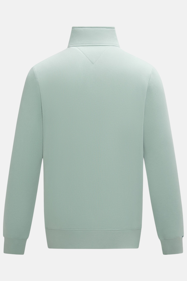 6th Sense Flux quarter-zip top in pale jade, back view with stand collar and long sleeves