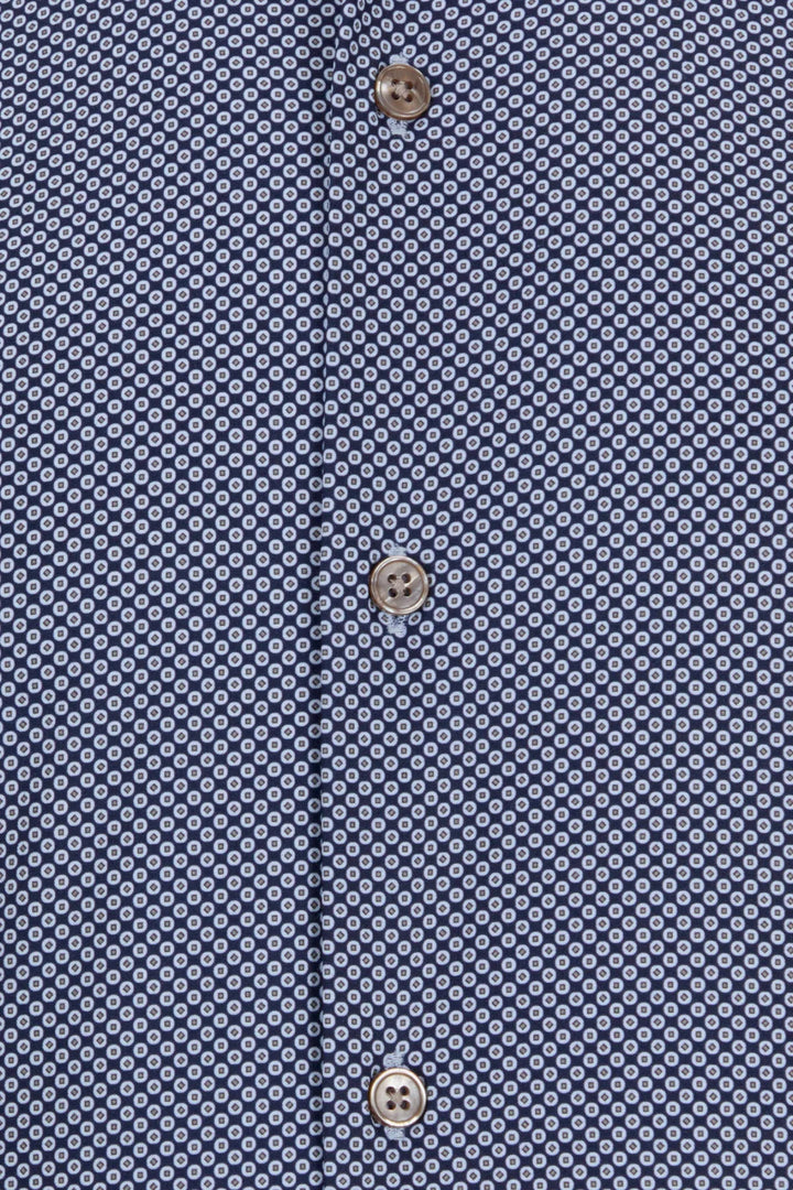 Blue textured shirt fabric with three buttons on the front placket