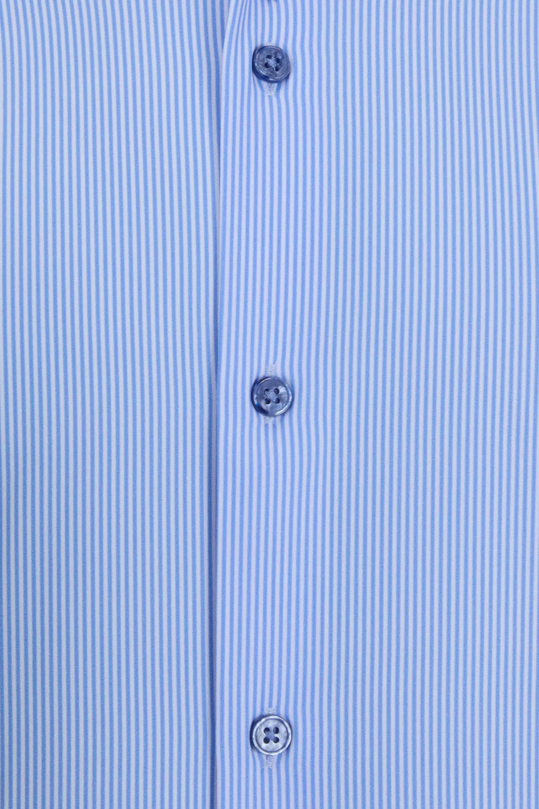 Striped performance shirt placket close-up with three blue buttons and stitched seams
