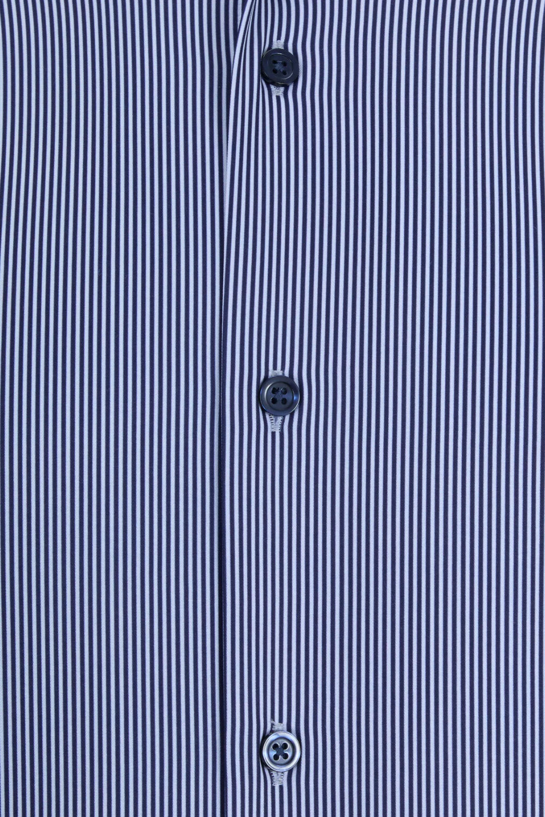 Light blue striped shirt placket with three dark buttons