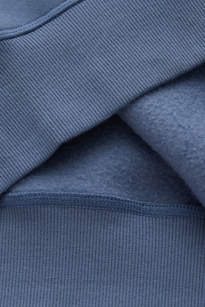 6th Sense hoodie close-up showing soft brushed interior and textured outer knit