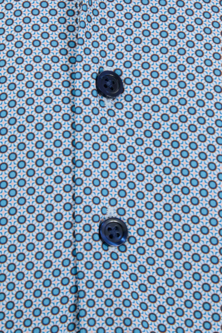 Light blue patterned polo shirt with dark button detail on placket