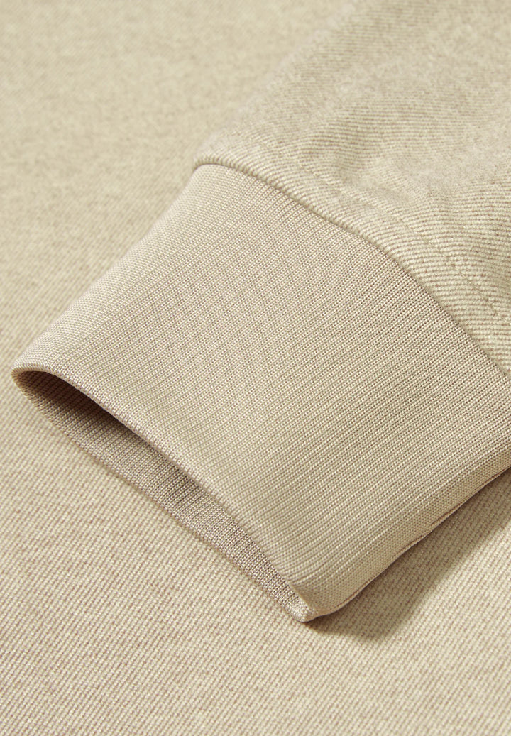 Cobblestone knit sleeve cuff with ribbed hem edge detail
