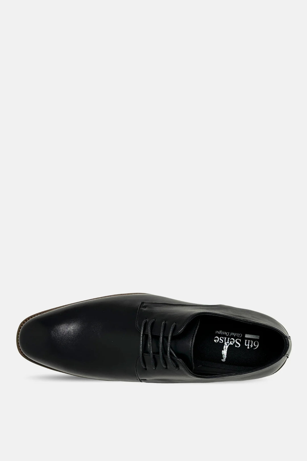 Black leather lace-up oxford shoe close-up, black laces and round toe
