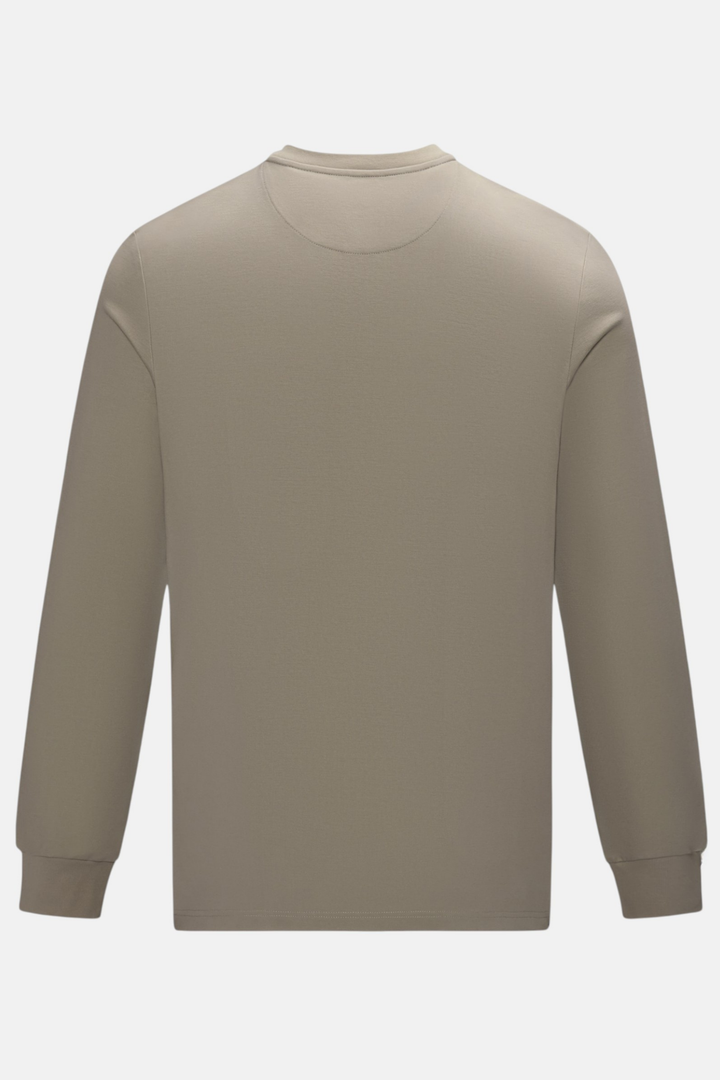 Back view of the Cinder long-sleeve top with a plain crew neckline