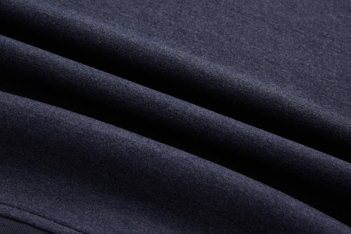 Navy knit fabric of the 1/4-zip top with smooth texture