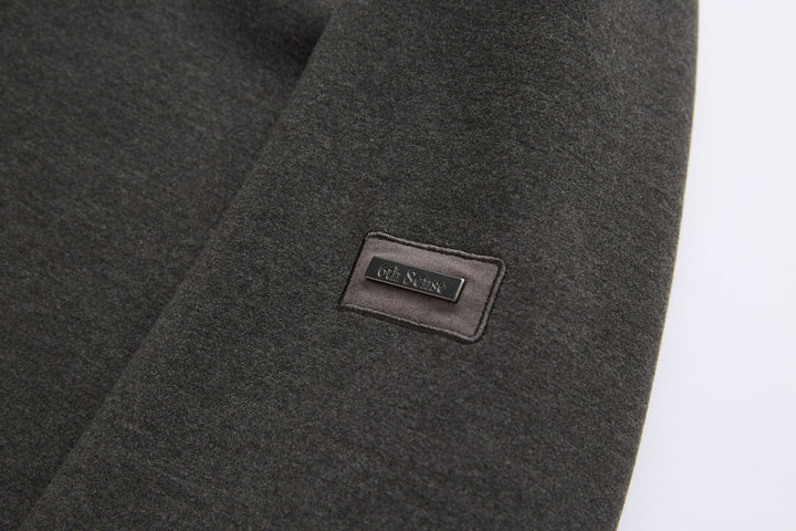 Peat 1/4-zip top logo patch on sleeve
