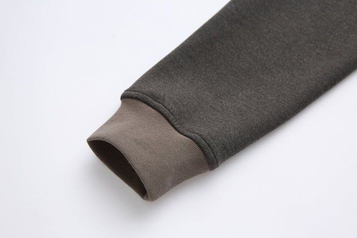 Peat 1/4-zip top ribbed sleeve cuff