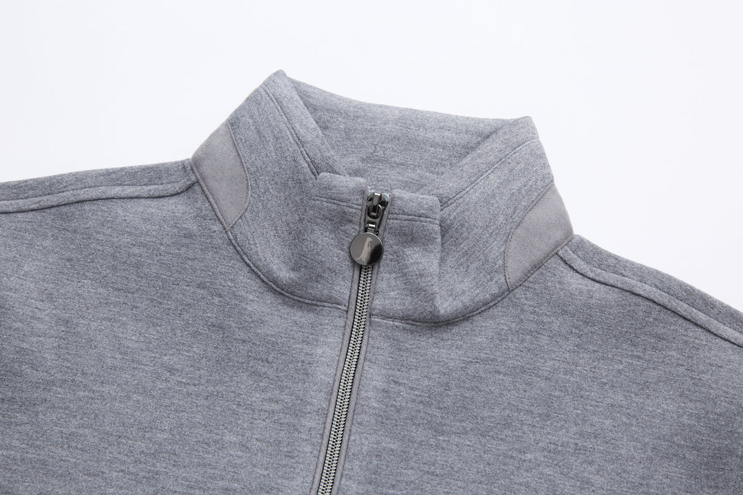 Gray quarter-zip top with stand collar and centered zipper