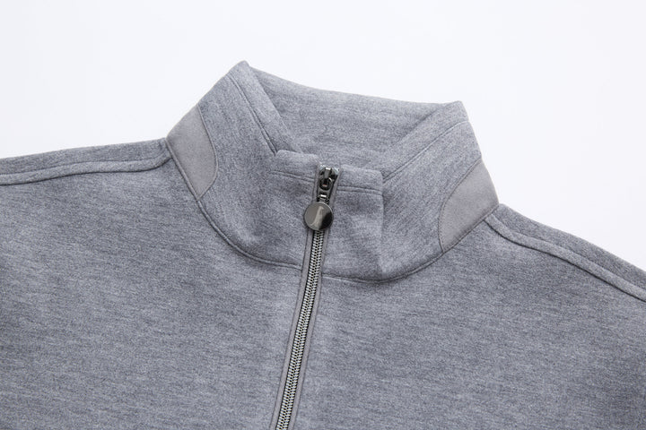 Gray quarter-zip top with stand collar and centered zipper