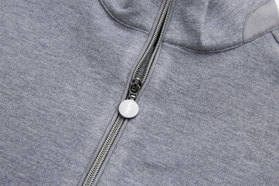 Gray quarter-zip top neckline with metal zipper pull and striped zipper tape
