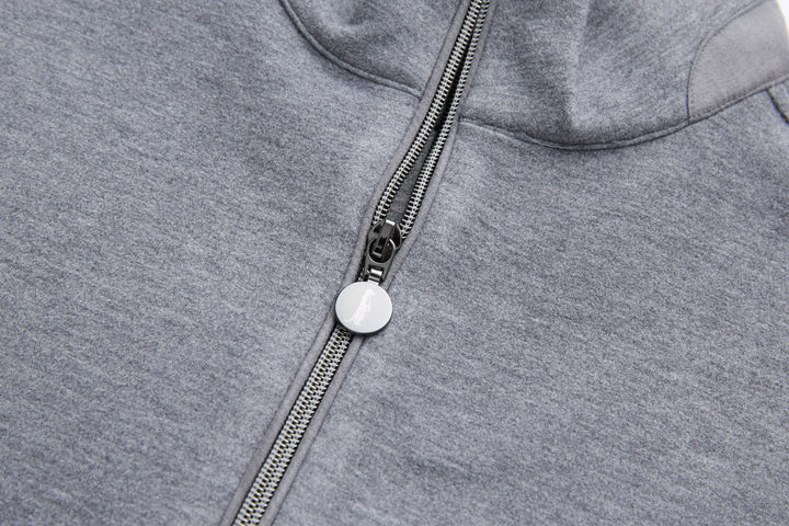 Gray quarter-zip top neckline with metal zipper pull and striped zipper tape