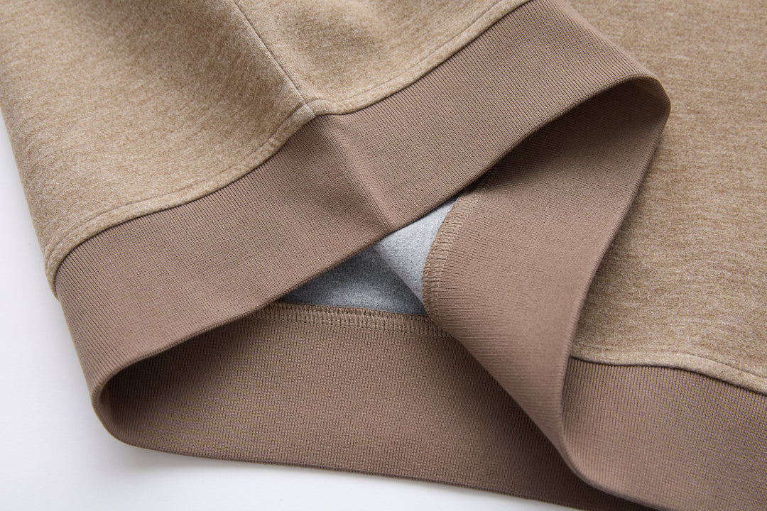 Taupe 1/4-zip top with ribbed cuffs and hem
