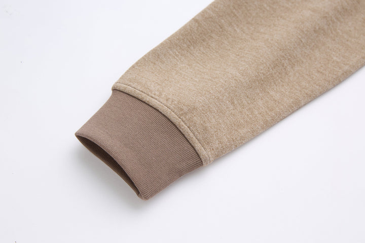 Taupe 1/4-zip top sleeve with ribbed cuff