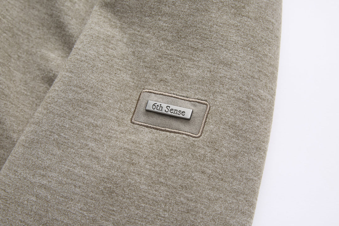 6th Sense 1/4-zip top logo label on heather walnut knit