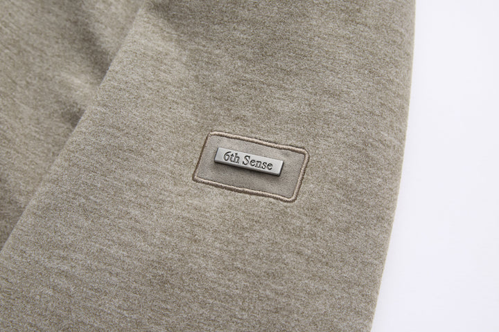 6th Sense 1/4-zip top logo label on heather walnut knit