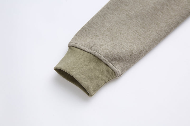 6th Sense 1/4-zip top sleeve cuff with olive contrast trim
