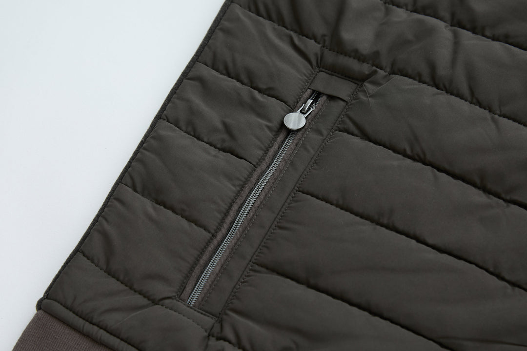 Dark peat quilted gilet with center front zipper and channel stitching