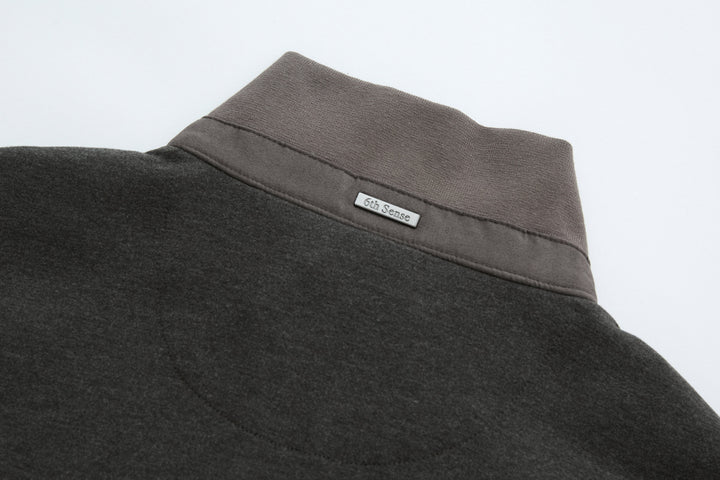 Dark peat gilet neck label: 6th Sense, stand collar