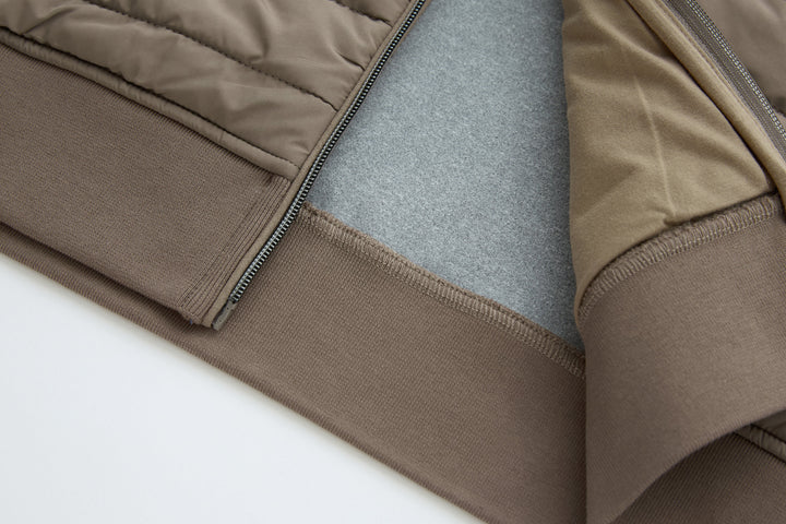 Taupe quilted gilet with contrast zipper tape and smooth knit trim