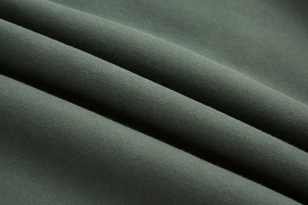 Rivet & Denim Agave hoodie fabric close-up in dark green knit