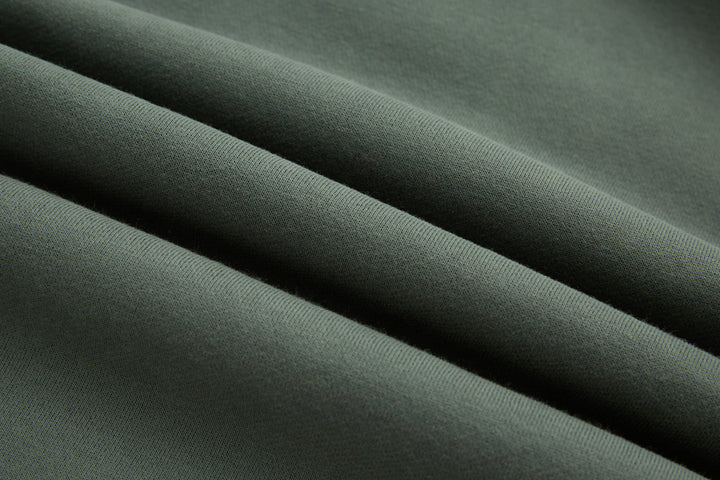 Rivet & Denim Agave hoodie fabric close-up in dark green knit