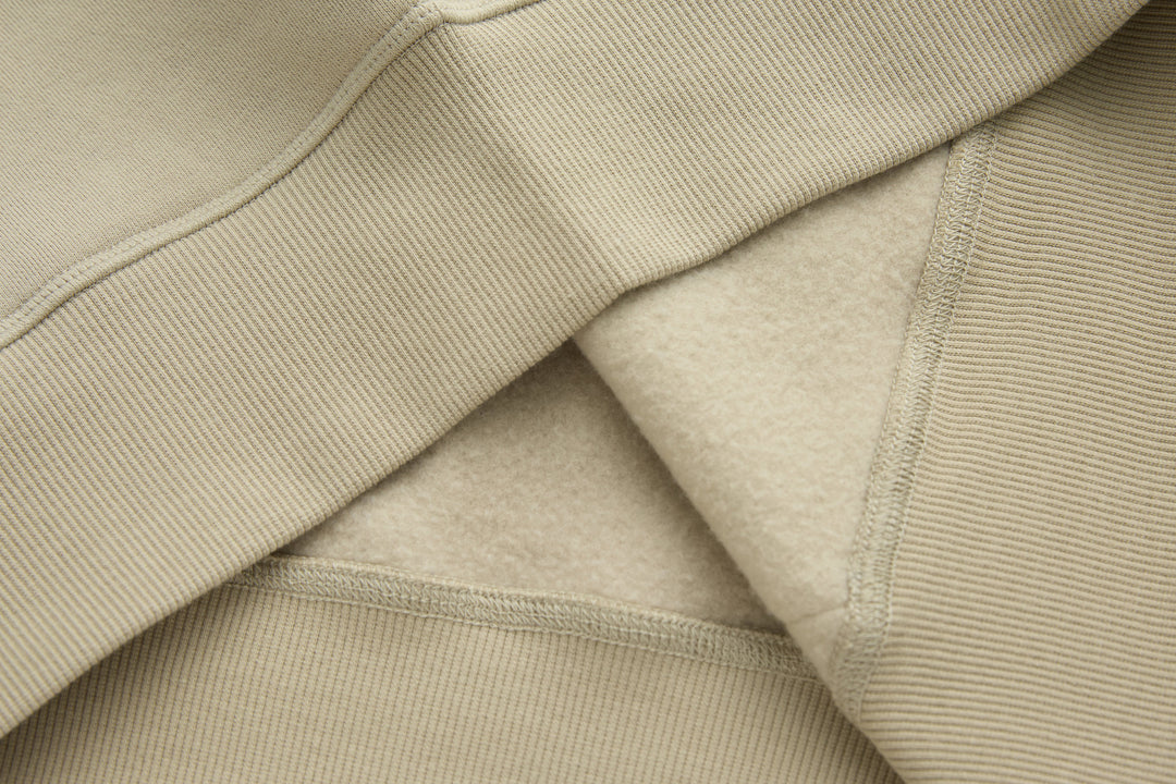 Rivet & Denim hoodie hem and inner lining, ribbed cuff and soft fleece finish