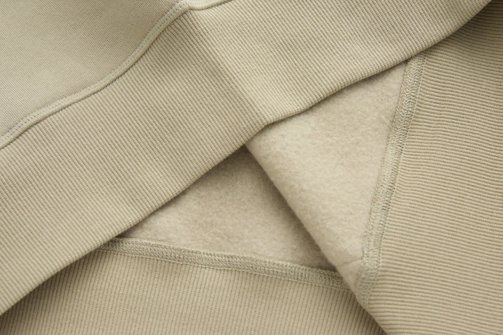 Rivet & Denim hoodie hem and inner lining, ribbed cuff and soft fleece finish