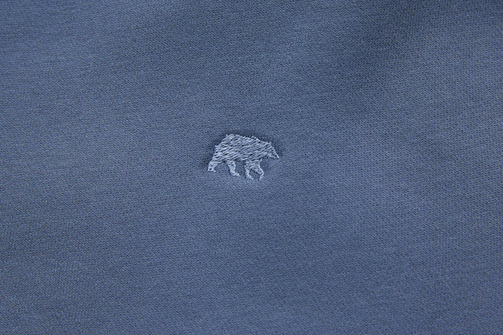 Blue denim hoodie chest logo embroidery detail