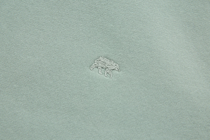 Jade denim hoodie chest logo embroidery, small archer graphic stitched on fabric.