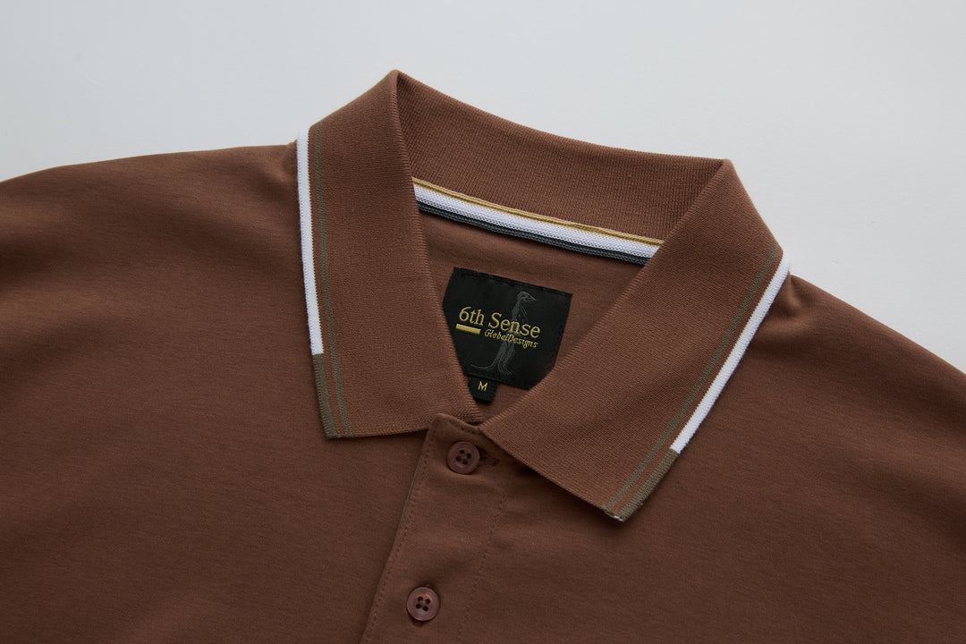 Brown polo shirt with contrast striped collar and button placket