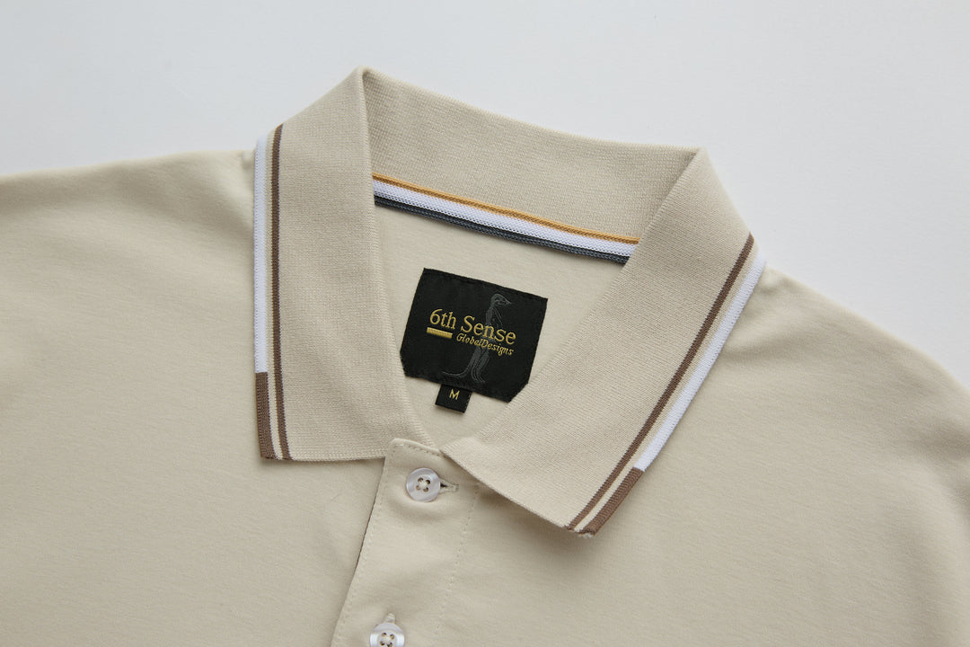 Cream polo shirt collar with striped trim and button placket