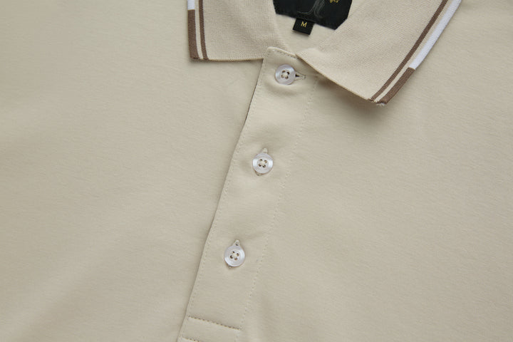 Cream polo shirt with three-button placket and brown-trim collar