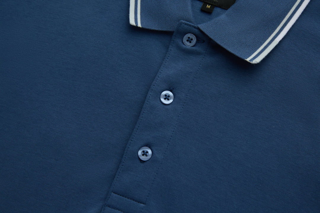 Blue polo shirt front with three button placket and collar tips
