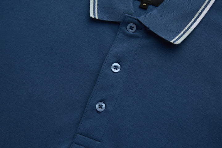 Blue polo shirt front with three button placket and collar tips