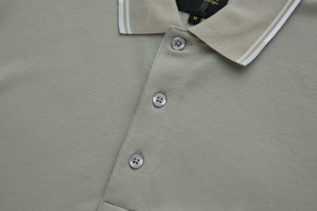 Light gray polo shirt with three-button front and ribbed collar trim