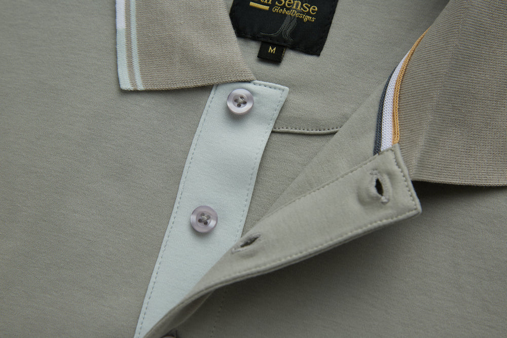 Light gray polo shirt collar and placket with button closure and neckline label