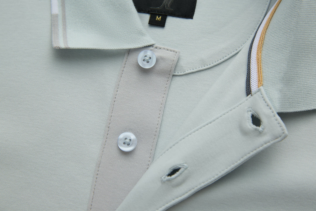 Oyster polo shirt with collar, button placket, and chest pocket flap