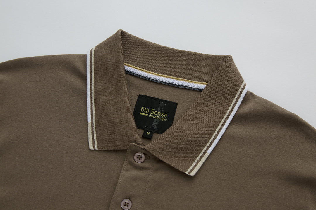 Walnut polo shirt with striped collar, button placket, and 6th Sense logo label